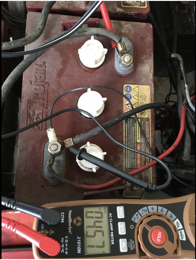 A schemacher devices measure the voltage in a car battery that is too low and won't start